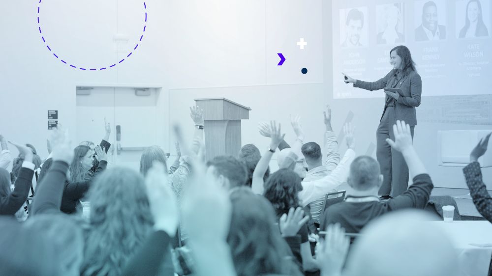Woman gives presentation with raised hands (1)